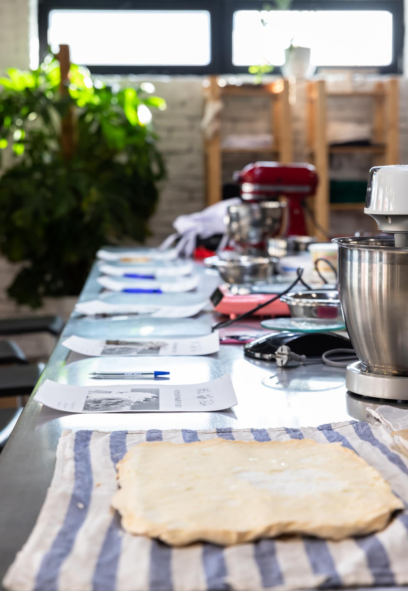 Workshop table with notebooks and plates